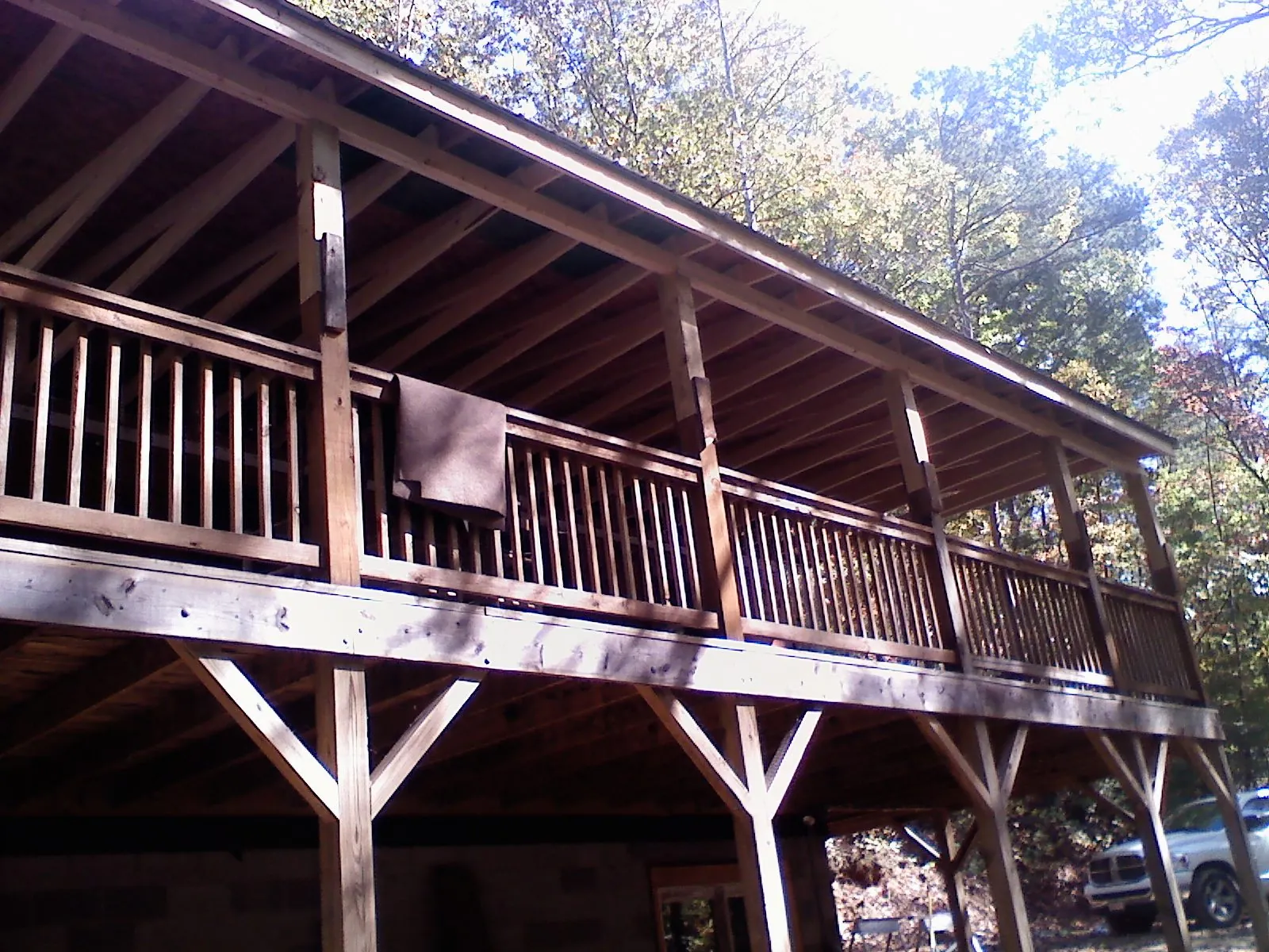 Timber framing under a new elevated porch and deck — Roof Leak Repair in Tuscaloosa by Roofing Brothers